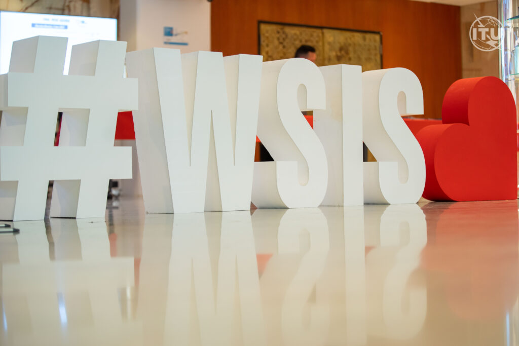 The WSIS Forum hashtag with a heart
